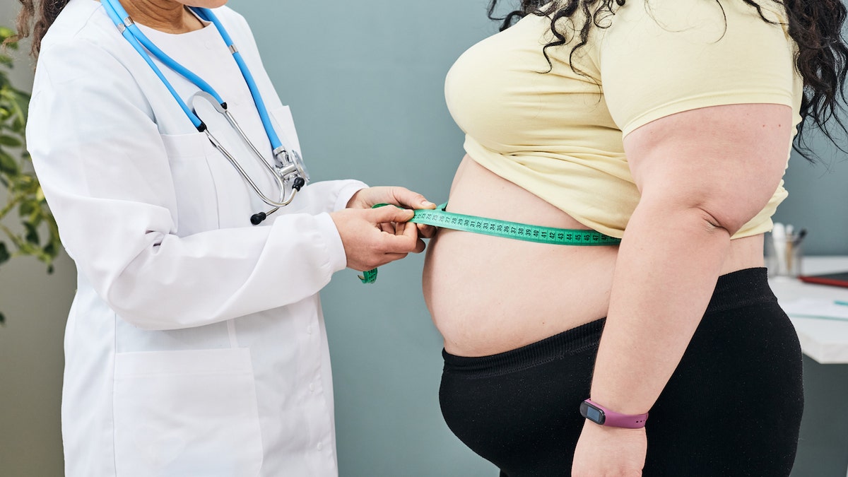 Woman with obesity to the doctor